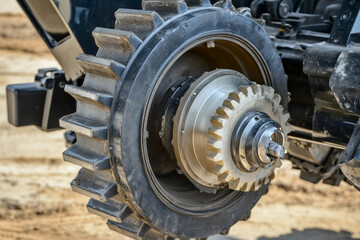 Naklejka premium Disassembled tractor reduction axle showcasing internal components Generative AI