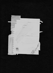 White cut paper layered on black background with abstract triangle cutout revealing an eye behind. Mysterious and conceptual design element with strong visual focus.