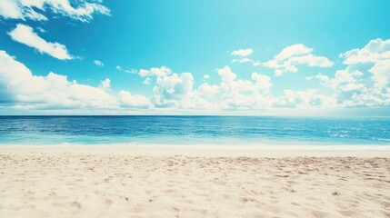 Obraz premium Idyllic tropical beach paradise showcasing a tranquil scene of pristine sand, a calm turquoise ocean, and a vast blue sky.