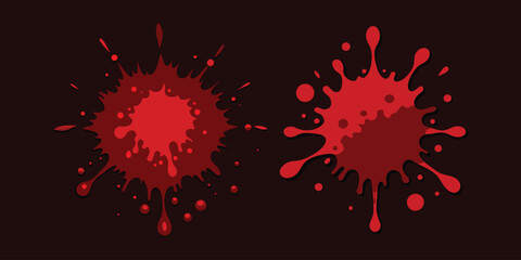 Two blood splatters on a dark surface