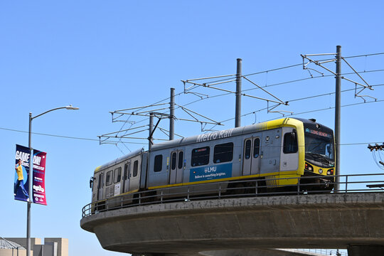 LOS ANGELES - 9 MAY 2025: Metro Rail train on overpass, an urban transit system serving Los Angeles consisting of four light rail lines and two rapid transit lines serving 102 stations.