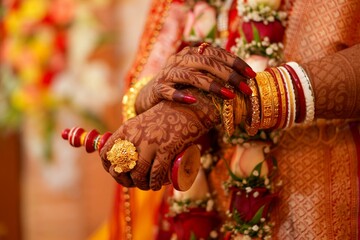 Gachkouto, held by a Bengali bride, symbolizes Bengali wedding culture and rituals