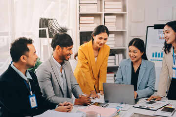 Team of financial advisory services. Asian advisor showing plan of investment to clients in the consultancy office..