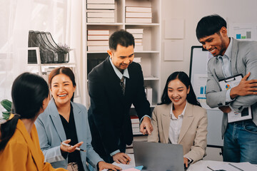 Team of financial advisory services. Asian advisor showing plan of investment to clients in the consultancy office..