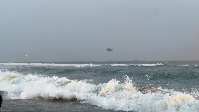 MH-60R SEAHAWK Indian Navy Helicopter in Indian ocean for mock drill
