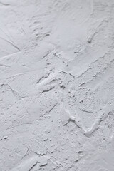 White acrylic illustration textured plaster. Drops, lines, arrows, cracks in close-up. Drawing with a spatula