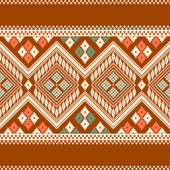 Seamless southwestern pattern with tribal diamond motifs in brown, coral pink, sage green, and cream. Perfect for textiles, home decor, fashion, and digital backgrounds with authentic ethnic appeal.