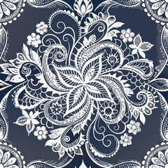 Seamless vector pattern of white and grey lace motifs on navy  