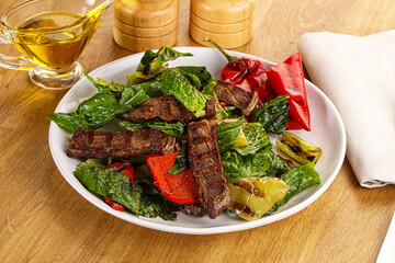 Salad with grilled beef steak