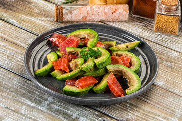 Salad with avocado and salmon
