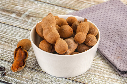 Tropical exotic Tamarind fruit heap