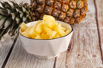 Sweet canned pineapple fruit pieces