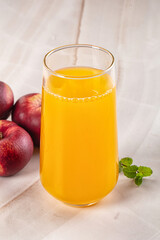 Vitamin beverage - peach juice glass