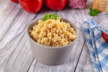 Vegan cuisine - boiled bulgur garnish