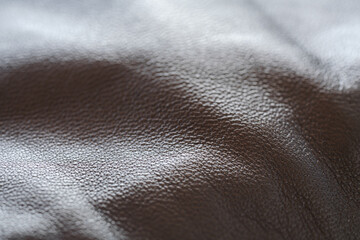 Closeup full grain gray brown leather background