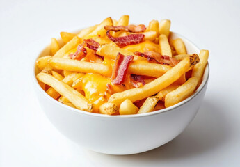 A bowl of crispy french fries generously topped with melted cheddar cheese and crispy bacon bits, a delicious and satisfying snack or side dish. : Generative AI