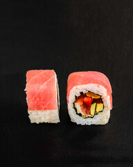 Japanese sushi rolls on a blackboard