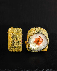 Japanese sushi rolls on a blackboard