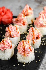 Japanese sushi rolls on a blackboard