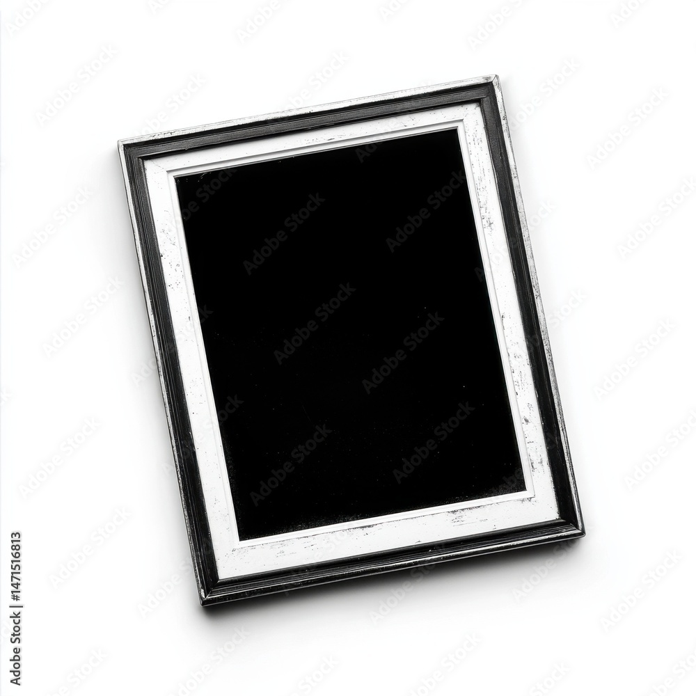 Poster a vintage, black and white picture frame with distressed paint lies on a white surface, showcasing i