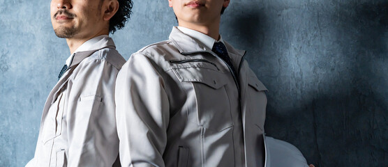 作業着を着た男性二人