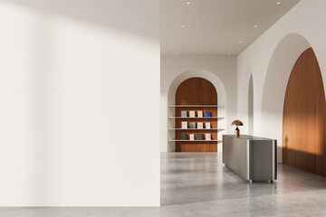 Modern minimalist interior with arched wooden elements, sleek metallic counter, and built-in bookshelf under soft lighting in spacious room. 3D Rendering