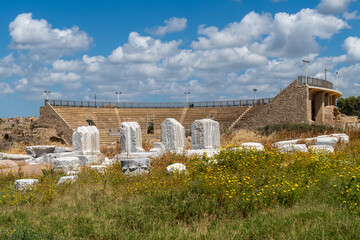 Architectural features with the Roman Amphitheater in the background Caesarea National Park in...