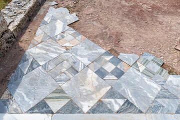 Ancient marble tiled floor at at Caesarea National Park in Caesarea, Israel.
