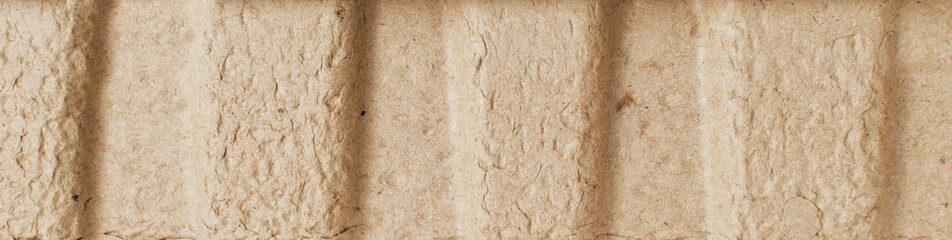 A fragment of a cardboard packing box