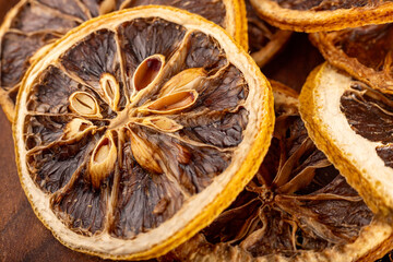 Dried lemon slices under macro lens, white background