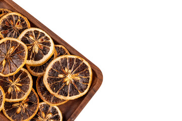 Fototapeta premium Dried lemon slices under macro lens, white background