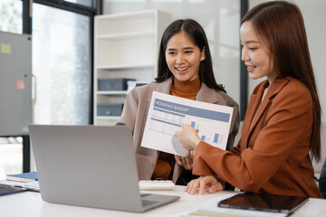 Businesswomen team or financial data analysts working, Plan to analyzing projects in the office.