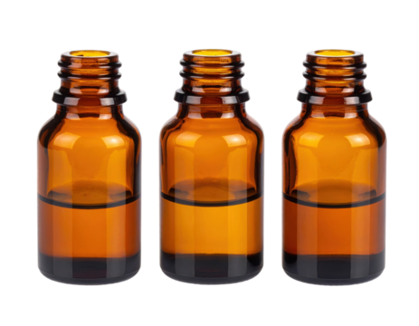 Three amber glass bottles with open necks are arranged side by side.