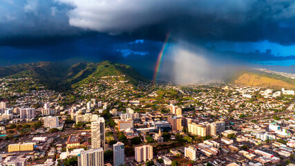 Sunny scenery of Honolulu, Hawaii, USA. Drone footage rising above Ala Wai Canal outlining Waikiki...