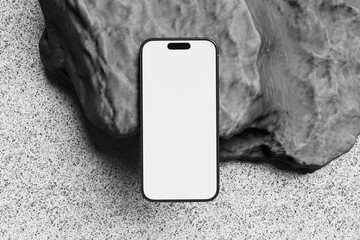 Blank smartphone and Rock