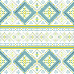 Green and yellow geometric ethnic boho seamless pattern. Tribal pattern. Folk motif. Textile rapport. Ideas for wallpaper, wrapping, and textiles.