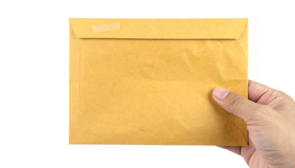 Hand holding a brown envelope, ready to be mailed