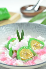 Green banana ice covered in a pandan leaf flour.