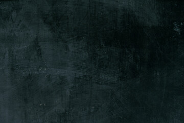 Dark grey black slate scratch background or texture.