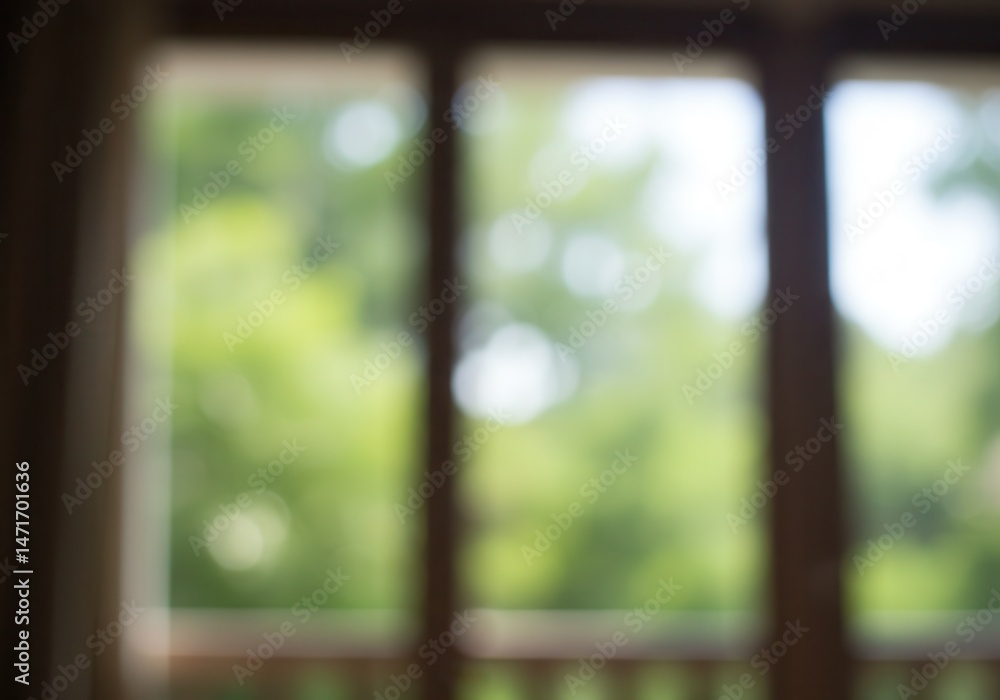 Poster abstract view through a window with green trees outside in soft focus