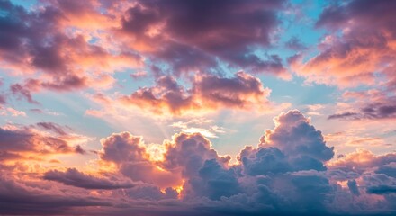 Fototapeta premium Dreamlike Cloudscape: Sunset Hues - Serene sunset cloudscape, symbolizing peace, hope, tranquility, freedom, and wonder. A vibrant, colorful display in the heavens