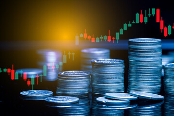 Double exposure of graph , stationary and rows of coins for goal office , finance and business concept background and forex trading graph with economy trends business or finance background.