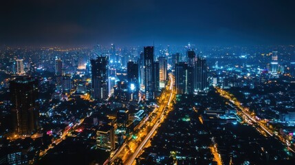 Fototapeta premium Cityscape at night with illuminated skyscrapers and roadways forming a dynamic urban scene