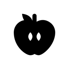 Silhouette of a halved apple with visible seeds and a leaf and stem on a white background image view