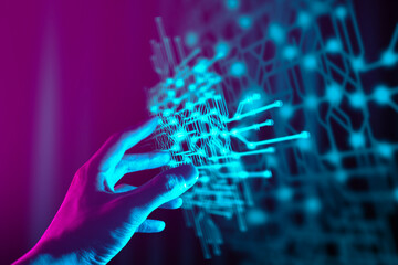 The hand of a businessman interactive touching a holographic image of a financial network,...