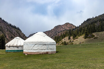 Two yurts in a mountain gorge. Nomad housing