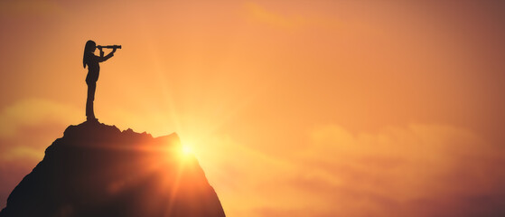 Businesswoman silhouette looking through telescope on mountain peak at sunrise, symbolizing vision and future planning concept. © Who is Danny