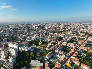 Elevated aerial shot of Porto, Portugal showcasing the expansive city grid and architecture