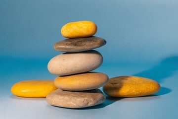 Smooth river rocks stacked in a Zen-like arrangement