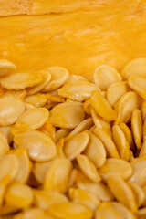 pumpkin pulp after harvesting, large pumpkin seeds inside pumpkin pulp